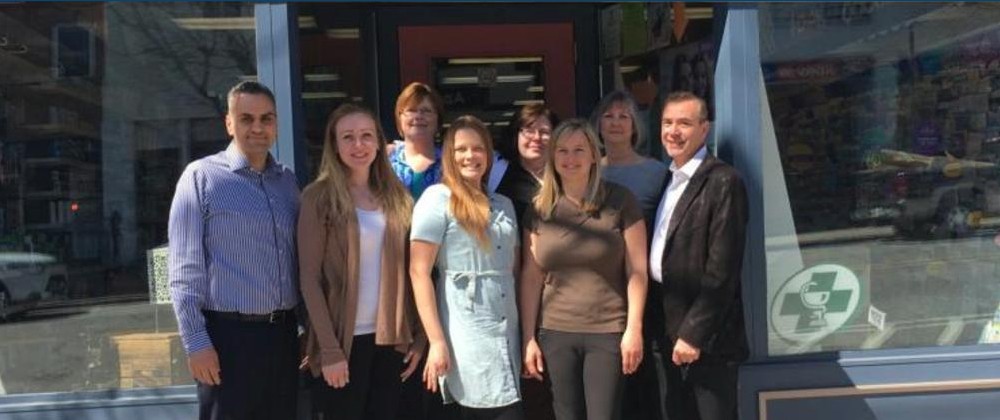 The Stutt's Pharmacy team standing outside the store
